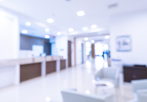 Blurred photo of a waiting room and hallway